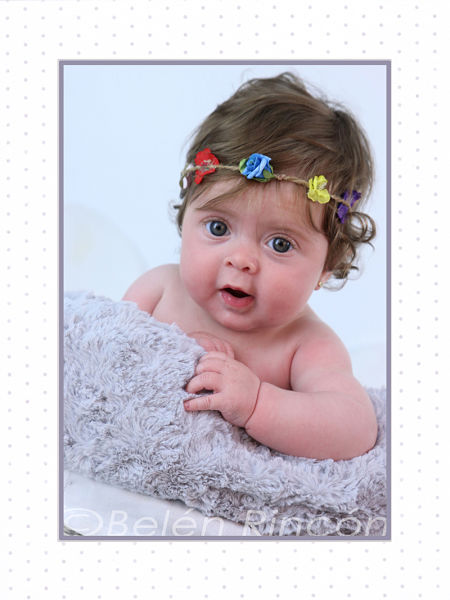 Fotografía infantil y sesiones fotográficas de seguimiento de bebés.